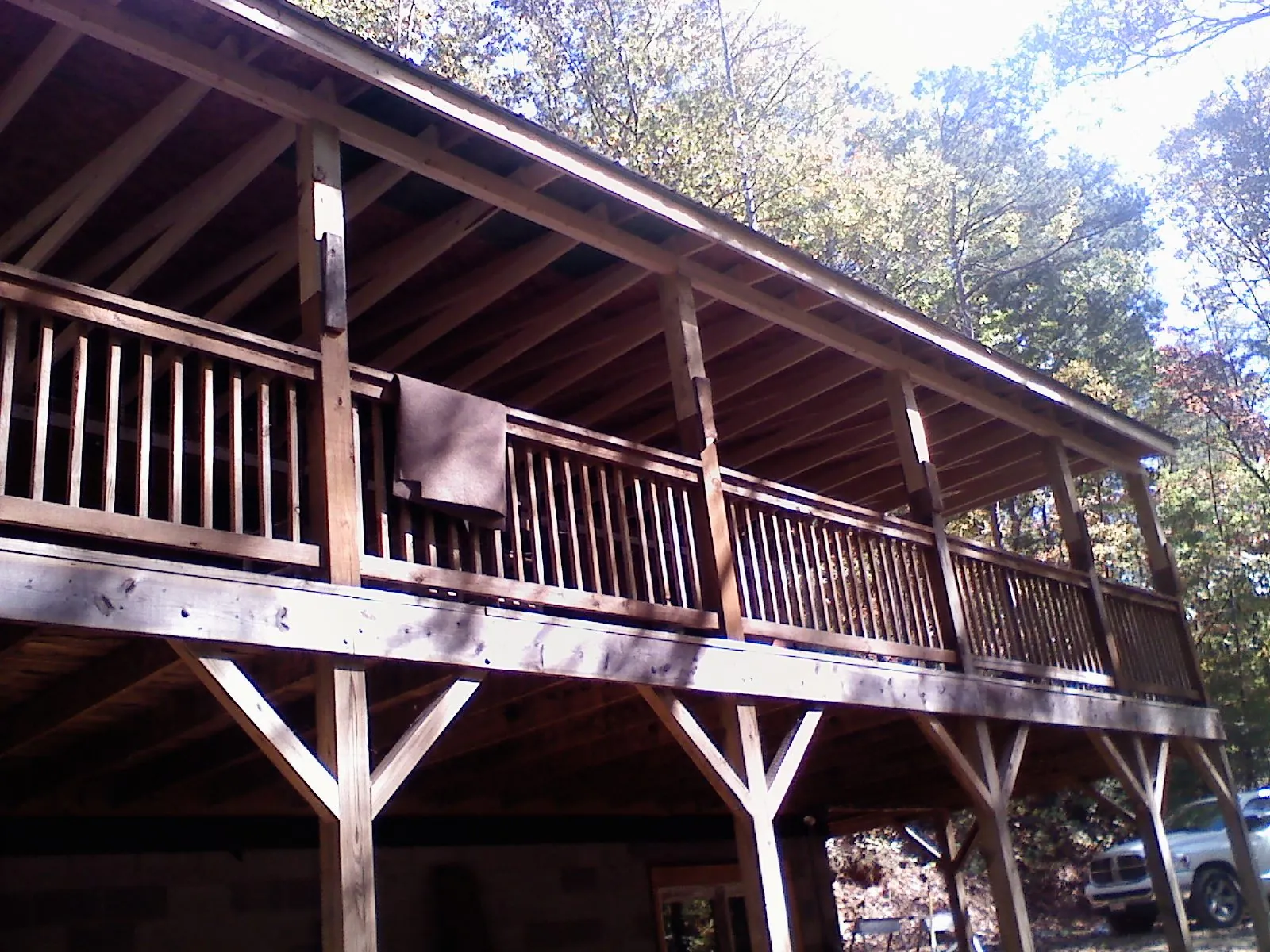 Timber framing under a new elevated porch and deck — Roof Leak Repair in Keego Harbor by Roofing Brothers